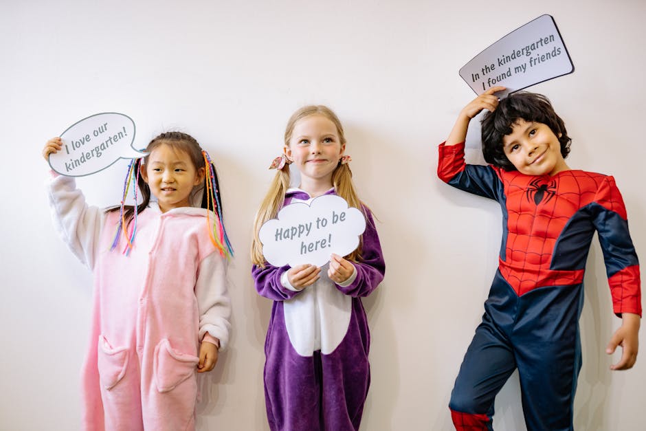 Children holding positive signs