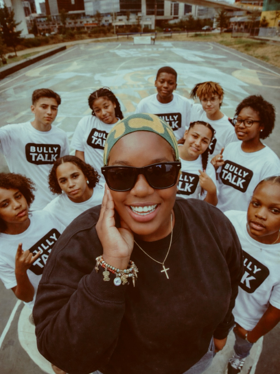 Kina with the Bully Talk squad and team
